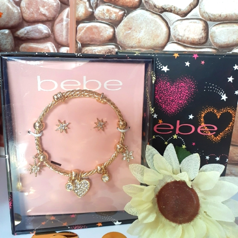 Bebe charm bracelet earing set